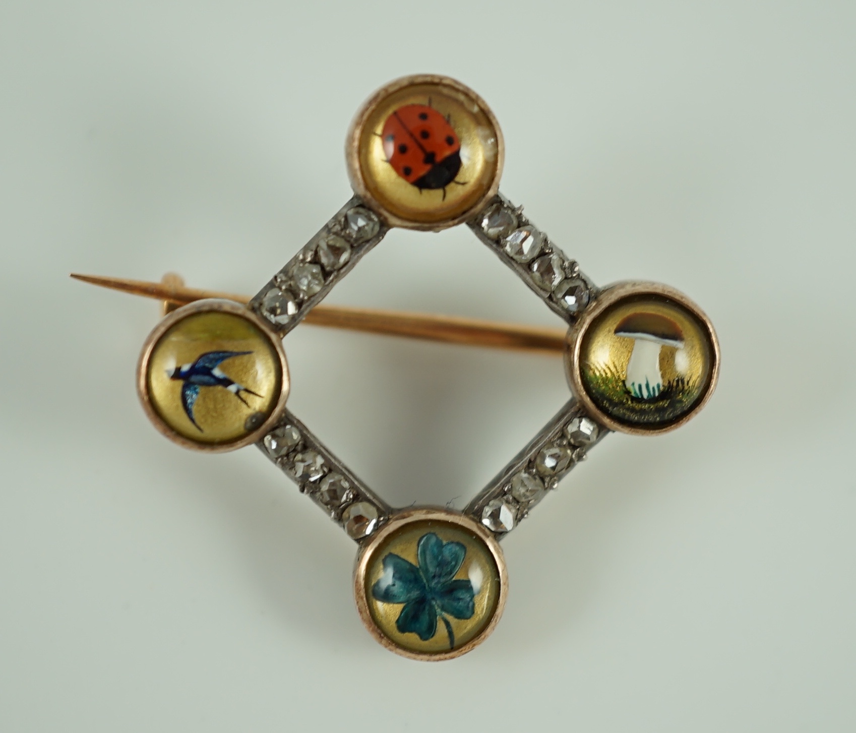 A late 19th Viennese gold, Essex crystal and rose cut diamond set diamond shaped brooch